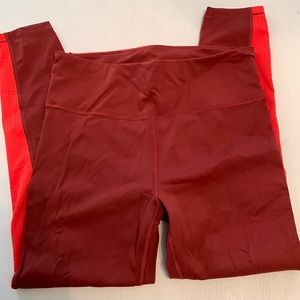 Athleta ultimate 7/8 tight rust M stash pocket